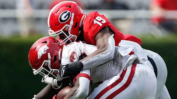 Georgia's Adam Anderson tackles an Arkansas player